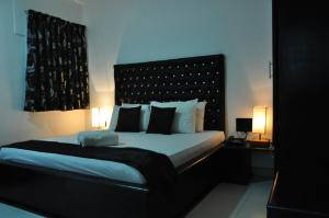 Letto o letti in una camera di Villa Hotel