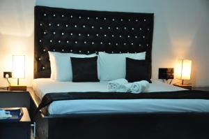 Letto o letti in una camera di Villa Hotel