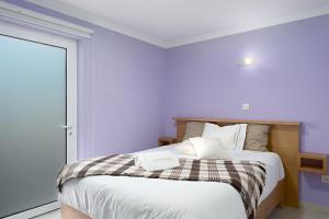 Uma cama ou camas num quarto em Casas de Sequeiros