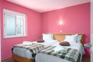 Uma cama ou camas num quarto em Casas de Sequeiros