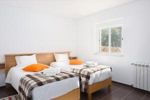 Uma cama ou camas num quarto em Casas de Sequeiros