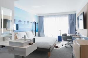 TV/Unterhaltungsangebot in der Unterkunft Novotel Charleroi Centre