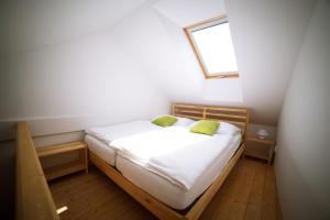 A bed or beds in a room at Hotel Bristol