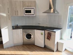 Kuchyňa alebo kuchynka v ubytovaní Exclusive New Apartment