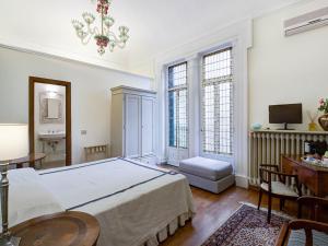 Un pat sau paturi într-o cameră la Your Florence