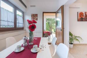 Ein Sitzbereich in der Unterkunft Apartments Villa Tre Marie