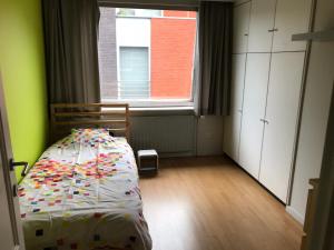 En eller flere senger på et rom på Appartement224