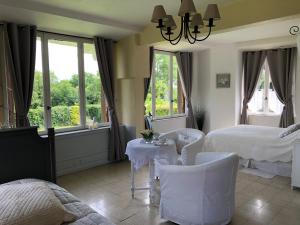 Ένα ή περισσότερα κρεβάτια σε δωμάτιο στο Chambre d'hotes Romance