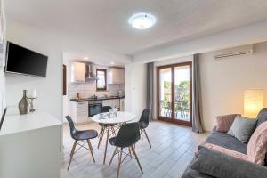 Ein Sitzbereich in der Unterkunft Apartments Villa Tre Marie
