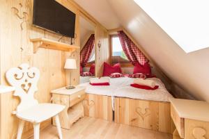 Posteľ alebo postele v izbe v ubytovaní Apartament Gawra Zakopane + 37 fotografií