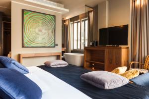 Voodi või voodid majutusasutuse Triviho Hotel toas