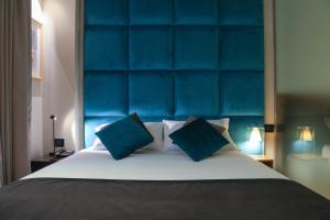 Voodi või voodid majutusasutuse Triviho Hotel toas