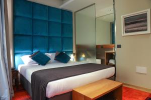 Voodi või voodid majutusasutuse Triviho Hotel toas