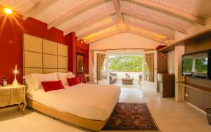 Ένα ή περισσότερα κρεβάτια σε δωμάτιο στο Hotel Boutique El Triángulo