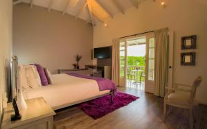 Ένα ή περισσότερα κρεβάτια σε δωμάτιο στο Hotel Boutique El Triángulo