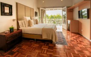 Ένα ή περισσότερα κρεβάτια σε δωμάτιο στο Hotel Boutique El Triángulo