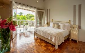 Ένα ή περισσότερα κρεβάτια σε δωμάτιο στο Hotel Boutique El Triángulo