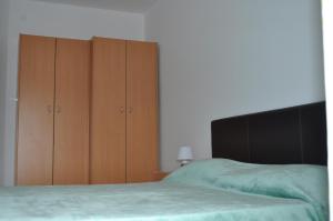 Postel nebo postele na pokoji v ubytování Apartments Matej & Irena