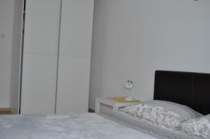 Postel nebo postele na pokoji v ubytování Apartments Matej & Irena