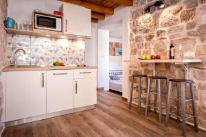 Kuchyň nebo kuchyňský kout v ubytování Old town apartment Mare + 23 fotografií