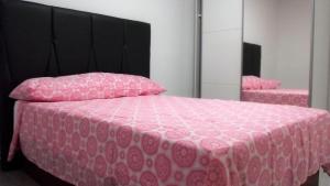 Llit o llits en una habitació de Apartamentos Atlas Terrassa III
