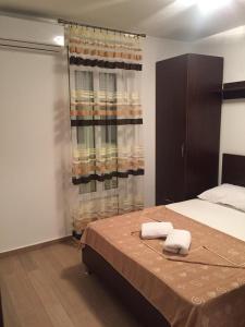 Voodi või voodid majutusasutuse Guesthouse Marko toas