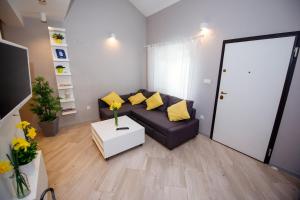 Televízia a/alebo spoločenská miestnosť v ubytovaní Apartment 63 - 1