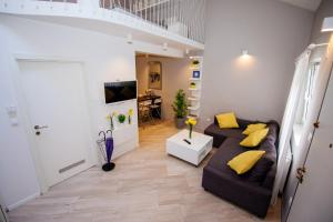 a living room with two couches and a television at Apartment 63 - 1 in Zagreb