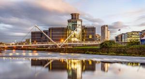 a view of a city with a river and buildings at Prime Apartments Leeds in Leeds