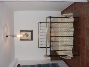 A bed or beds in a room at Cortijo la Colá