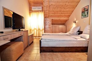 Cama o camas de una habitación en Velena Apartments