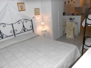 A bed or beds in a room at Casa VINTAGE