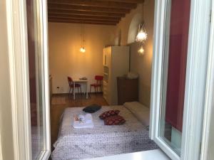 Postel nebo postele na pokoji v ubytování MyRoom Città Alta 1