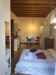 Postel nebo postele na pokoji v ubytování MyRoom Città Alta 1