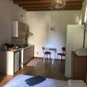 Kuchyň nebo kuchyňský kout v ubytování MyRoom Città Alta 1