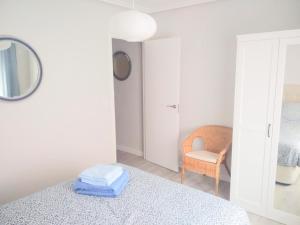 Postel nebo postele na pokoji v ubytování San Lorenzo House