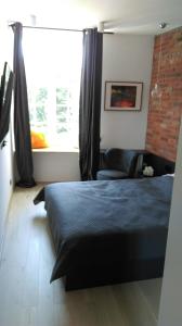 Posteľ alebo postele v izbe v ubytovaní Apartament Piwna 16 Gdańsk