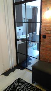 Kuchyňa alebo kuchynka v ubytovaní Apartament Piwna 16 Gdańsk