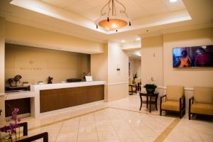 a waiting room at a hospital with a waiting counter at Polo Towers by Raintree in Las Vegas