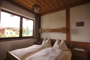 מיטה או מיטות בחדר ב-Kulmblick
