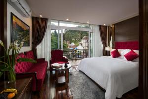 Postel nebo postele na pokoji v ubytování Sapa Horizon Hotel + 37 fotografií
