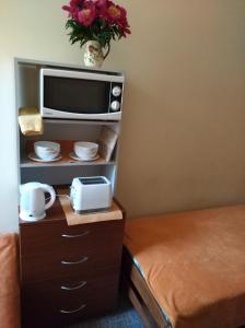 Příslušenství pro přípravu čaje a kávy v ubytování Hostel Lux