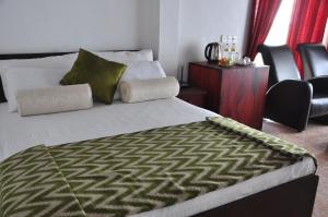 Letto o letti in una camera di Villa Hotel