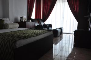 Letto o letti in una camera di Villa Hotel