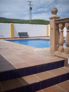 The swimming pool at or close to Cortijo la Colá