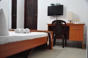 Letto o letti in una camera di Villa Hotel