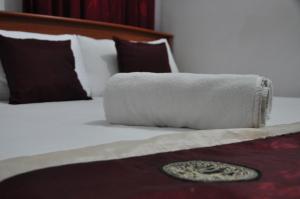 Letto o letti in una camera di Villa Hotel
