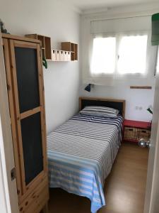 Posteľ alebo postele v izbe v ubytovaní Apartamento RITS Beachfront
