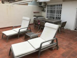 Posedenie v ubytovaní Apartamento RITS Beachfront