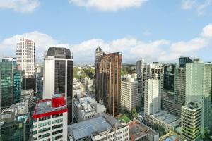 an aerial view of a city with tall buildings at QV Stays Spacious City Getaway in Auckland